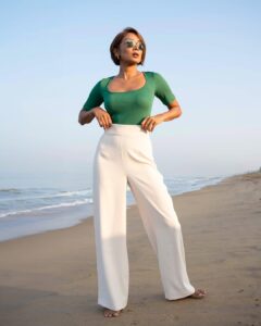 Green Knit Top with Flowing Ivory Trousers