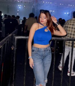 Concert Casual: Electric Blue Halter & High-Waisted Denim Combo